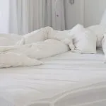 How To Tuck Sheets Under Heavy Mattress?